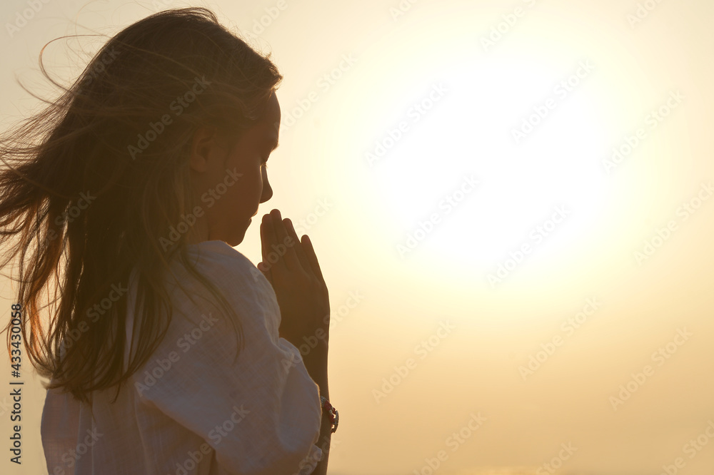 Little Girl praying Stock Photo