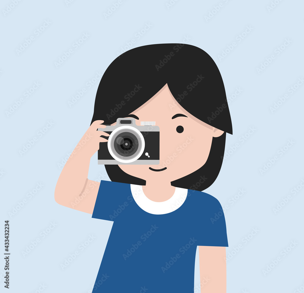 Little girl is holding a camera and taking a photo Little girl is holding a camera and taking a photo