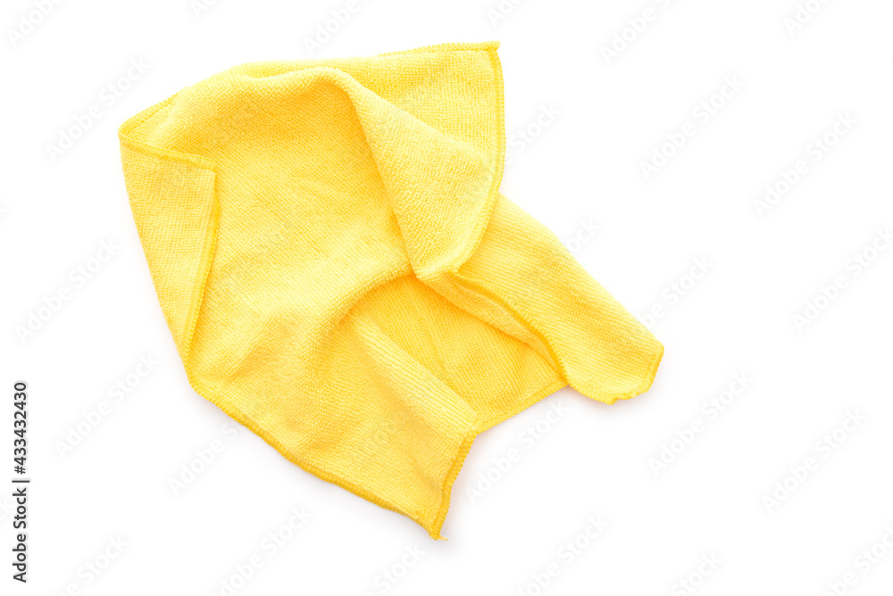 Yellow kitchen rug isolated on white. Crumpled used microfiber cloth clean, top view. Yellow kitchen rug isolated on white. Crumpled used microfiber cloth clean, top view.