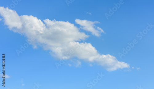 Blue sky background with beautiful white clouds.