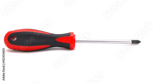 Close-up of a screwdriver on a white background. Tools, macro, equipment, machinery