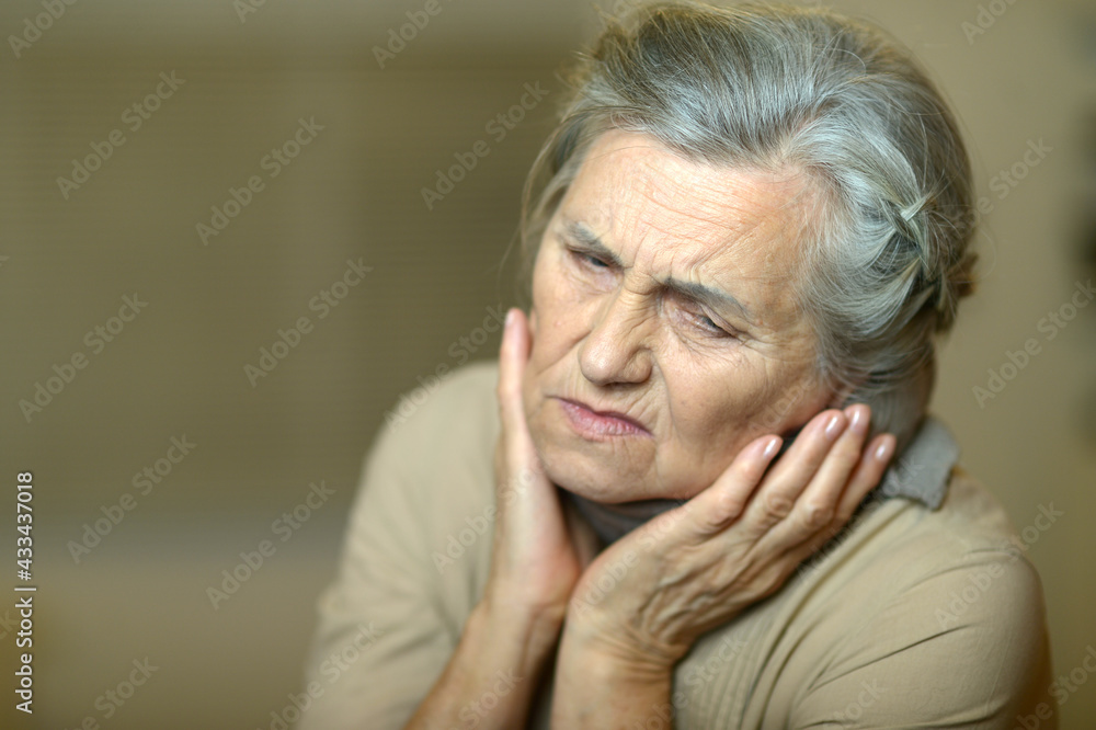 Close up portrait of sad ill senior woman Close up portrait of sad ill senior woman