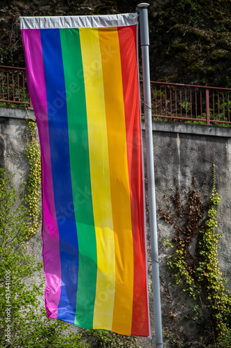A waving rainbow flag as a sign of tolerance and acceptance