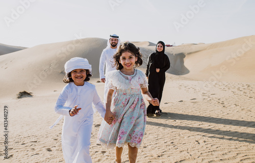 Photography Happy family spending a wonderful day in the desert making a picnic