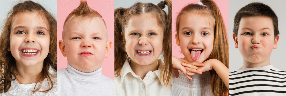 Art collage made of portraits of little and happy kids isolated on multicolored studio background. Human emotions, facial expression concept Art collage made of portraits of little and happy kids isolated on multicolored studio background. Human emotions, facial expression concept