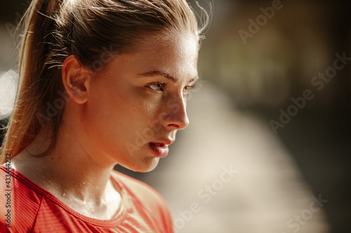 Bilde på lerret Close up photo of athletic blonde woman sweating taking a break from workout