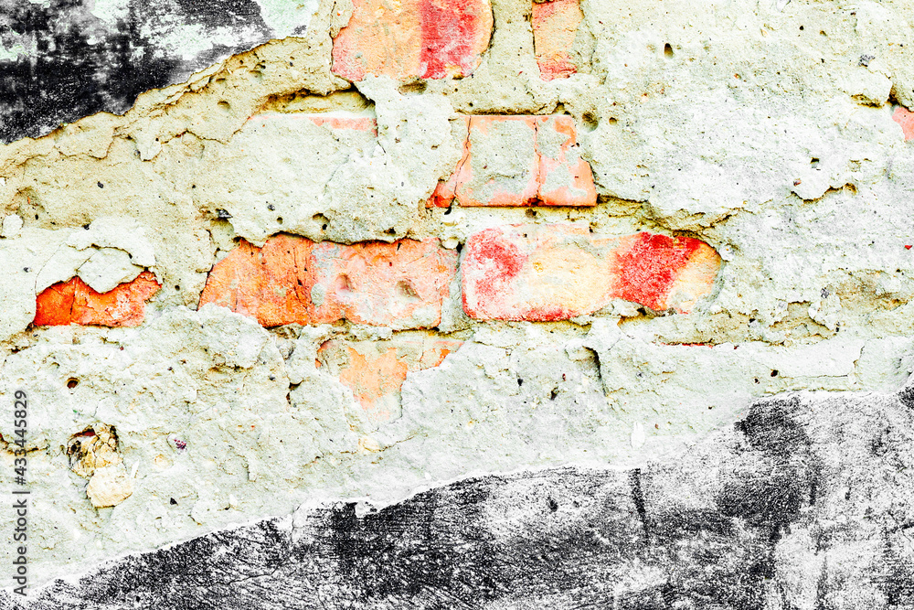 Fototapeta premium Texture of a concrete wall with cracks and scratches which can be used as a background