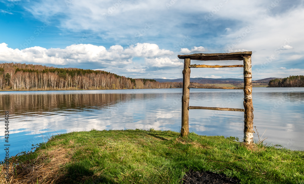 Vlasina lake scenery with beautiful clouds in the blue sky. Beautiful semi-artificial lake in Southeast Serbia Vlasina lake scenery with beautiful clouds in the blue sky. Beautiful semi-artificial lake in Southeast Serbia