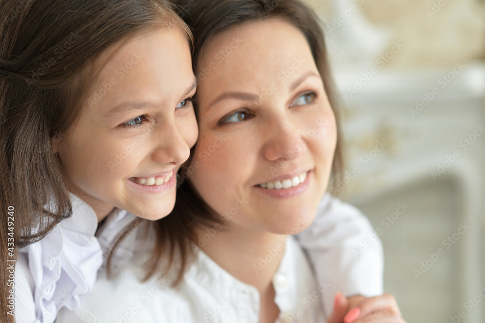 Beautiful young mother and cute little daughter posing Beautiful young mother and cute little daughter posing