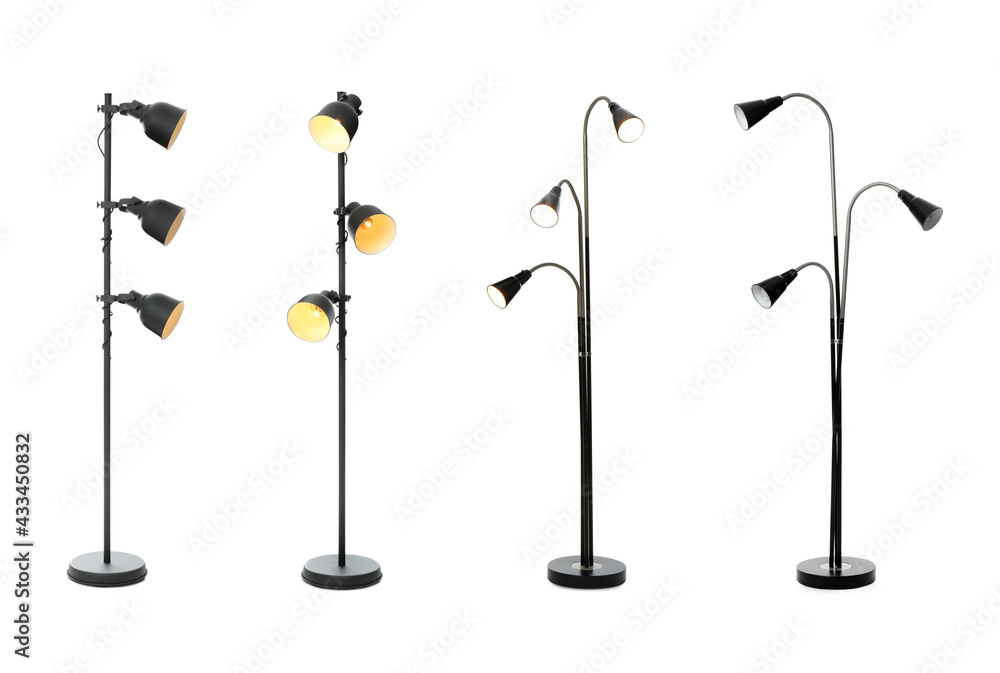 Set with different stylish floor lamps on white background
