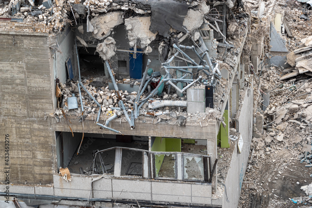construction site under construction work. Demolition of an old building in vacancy. debris looks almost like bombed. bad weather construction site under construction work. Demolition of an old building in vacancy. debris looks almost like bombed. bad weather