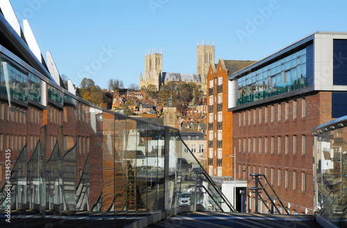The old city & cathedral on the hill from Brayford footbridge in Lincoln UK