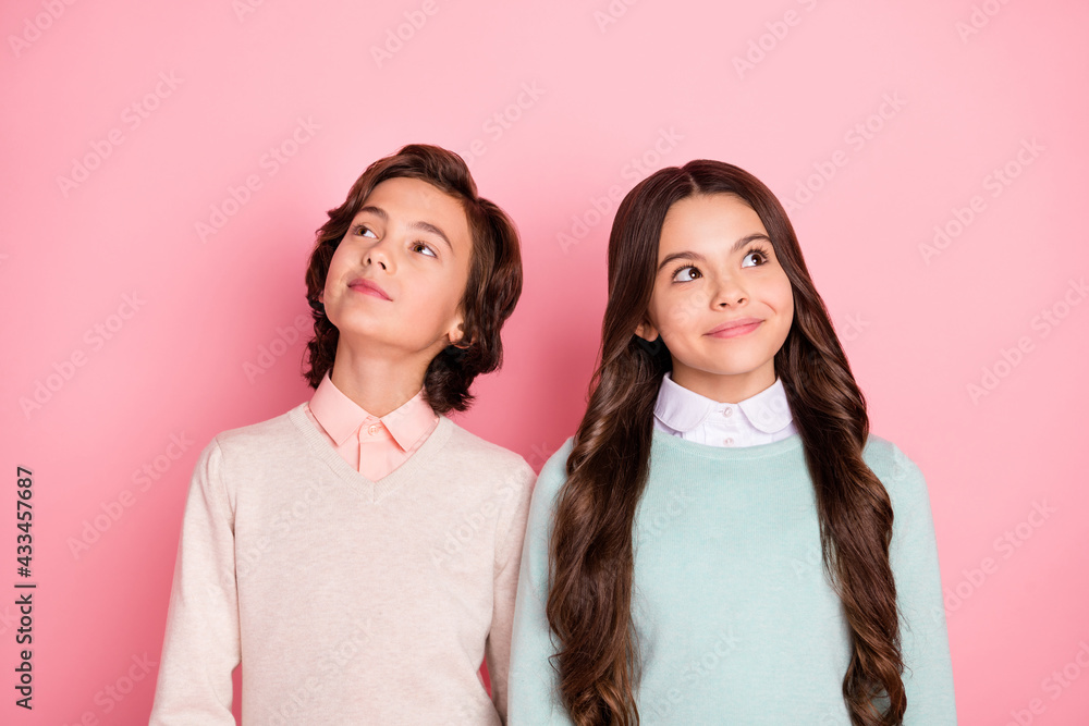 Portrait of attractive cheerful bewildered preteen kids creating