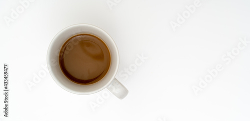 Top view, flat lay of black coffee cup on background white.