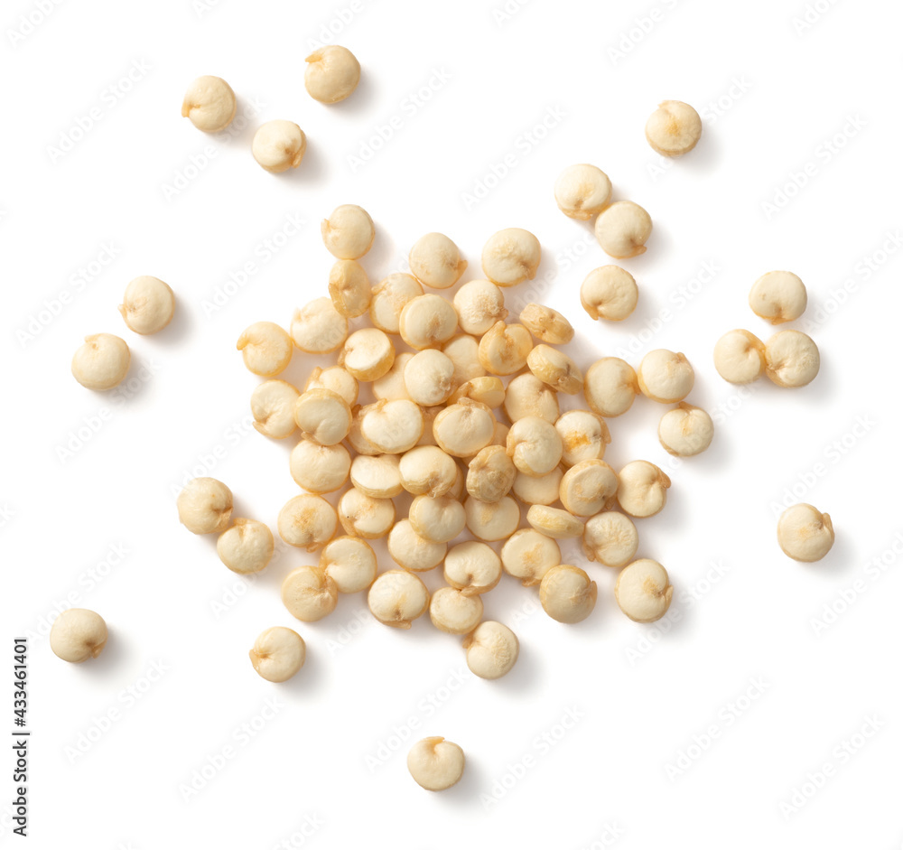 A small pile of raw white quinoa isolated on white background, top view A small pile of raw white quinoa isolated on white background, top view