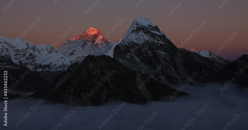 Last light of the day illuminating majestic Mount Everest.