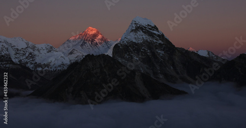 Last light of the day illuminating majestic Mount Everest.