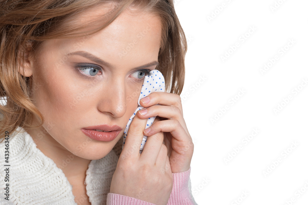 Portrait of sad young woman holding handkerchief Portrait of sad young woman holding handkerchief