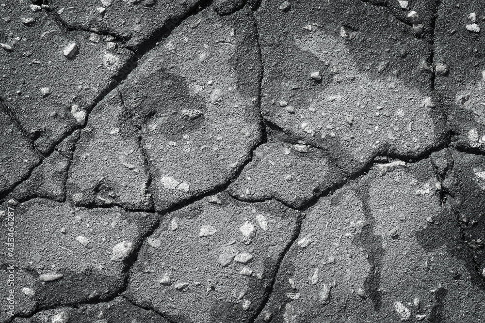 Obraz premium Asphalt concrete cracked gray background