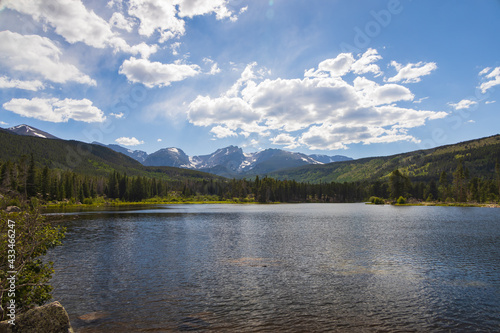 Sprague Lake with blue sky and white clouds in the sky background, Rocky Mountain National Park, Colorado