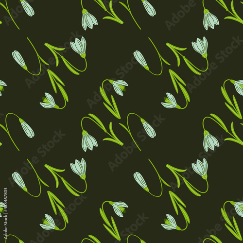 Green and blue colored bluebell seamless pattern in hand drawn style. Dark brown background. Floral backdrop.