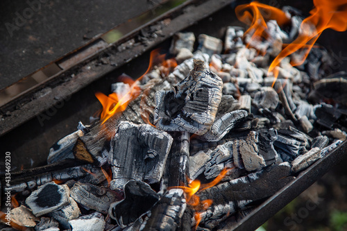 burning coals in the grill for frying meat