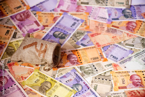 Photography Indian currency bank notes background with money bag