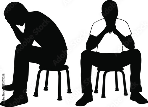 silhouettes of sad men on chairs
