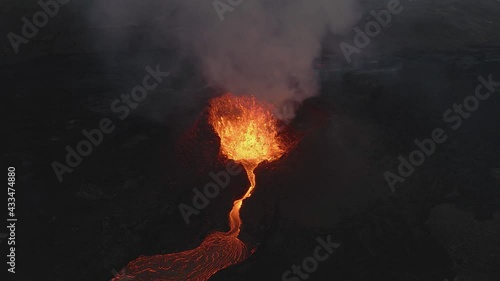 Fountain of magma and lapilli erupting from volcano crater, Fagradalsfjall in Iceland. Aerial view photo