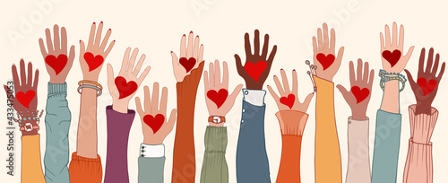 Arms and hands raised. Group of diverse people with heart in hand. Charity donation and volunteer work. Support and assistance. People diversity. Multicultural and multiethnic community