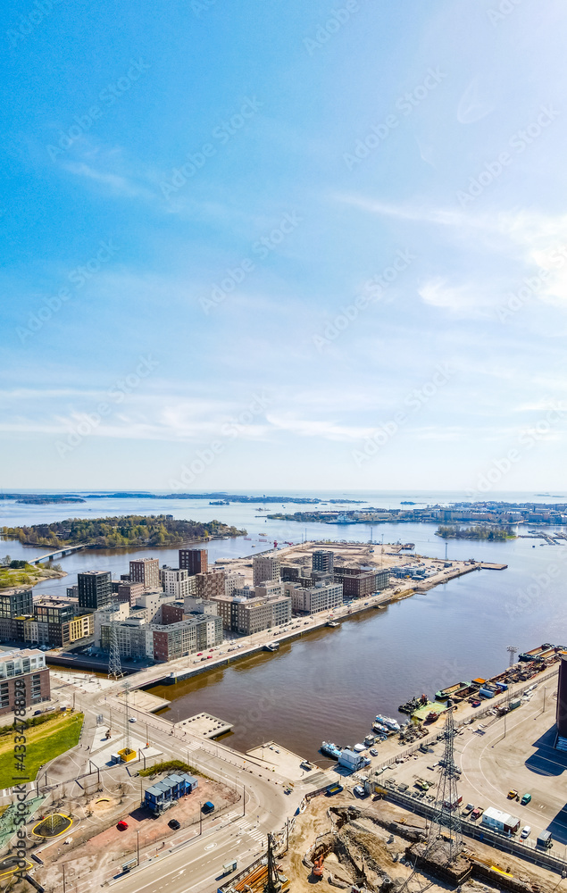 Aerial view of Helsinki city. Sky and colorful buildings.
Aerial view of Helsinki city. Sky and colorful buildings.