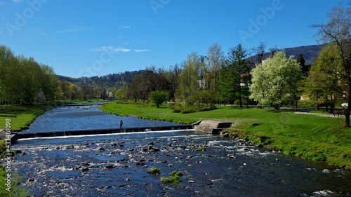 RZEKA WISŁA W BESKIDZIE ŚLĄSKIM. USTROŃ, POLSKA. photo