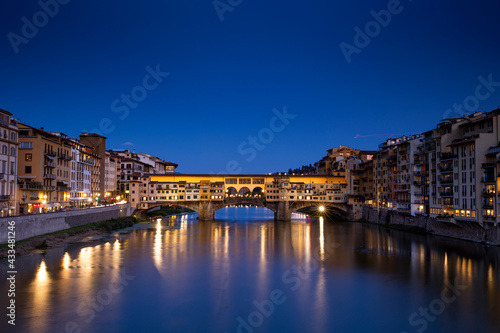 Ponte Vecchio over Arno river in Florence  Italy at blue hour after sunset.