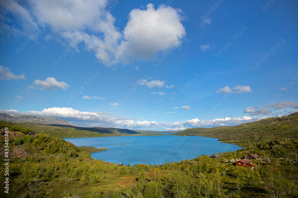 Sky with clouds over a lake in the Norwegian fjords Sky with clouds over a lake in the Norwegian fjords