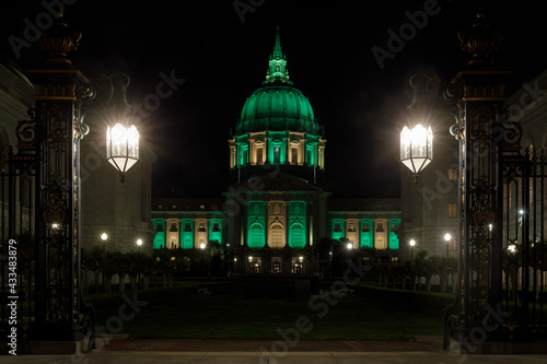 San Francisco City Hall Lit in Yellow and Green in Celebration of Mother's Day at Night.