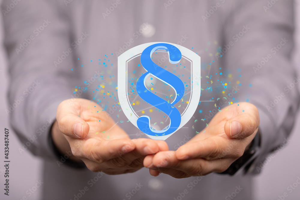 paragraph law sign digital in hand. paragraph law sign digital in hand.