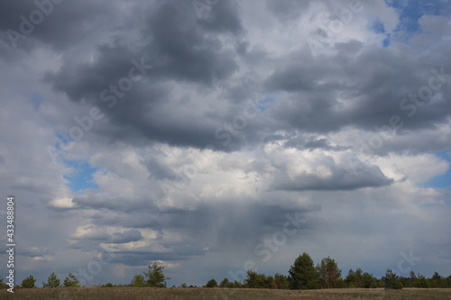 dense cloudy sky above prairie, natural outdoor background