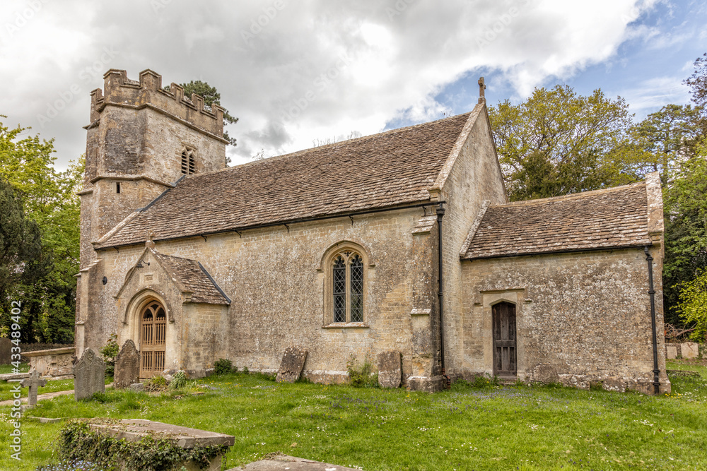 The parish church with 15th century tower in the village of Easton Grey, Wiltshire, England, United Kingdom