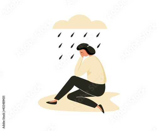 Depressed woman sitting on the floor and crying. Mental issues and apathy