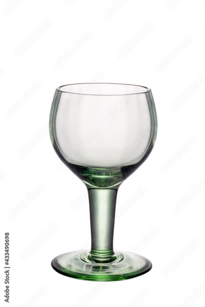 Empty small glass for brandy isolated on white. Studio shot Empty small glass for brandy isolated on white. Studio shot