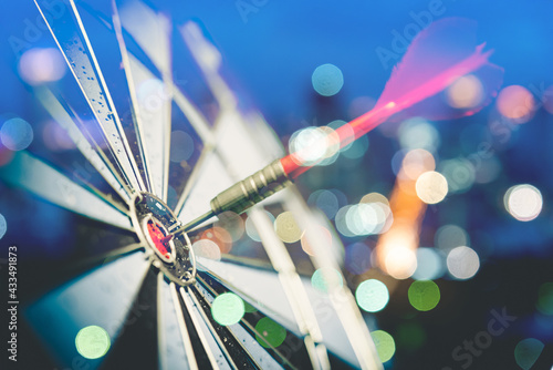 Bullseye is a target of business. Dart is an opportunity and Dartboard is the target and goal. So both of that represent a challenge in business marketing as concept.	