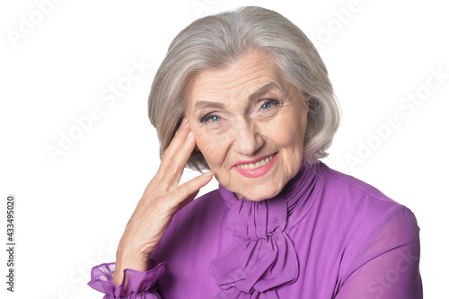 portrait of happy senior woman posing