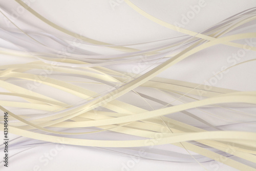 Abstract white and yellow color strip wave paper background. © Liliia