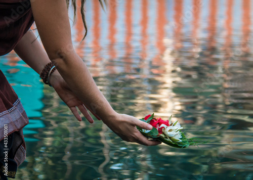 Hands flowers offerings ritual india water tradition