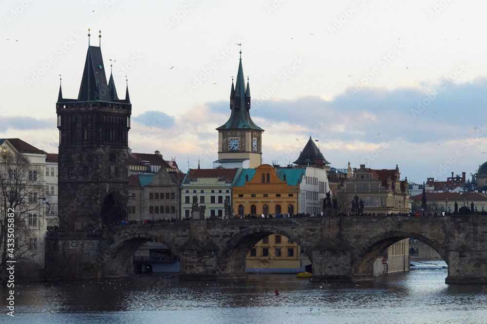 View of the medieval Charles Bridge over the Vltava River, connecting the historical districts of Mala Strana and the Old Place. Prague, Czech Republic View of the medieval Charles Bridge over the Vltava River, connecting the historical districts of Mala Strana and the Old Place. Prague, Czech Republic