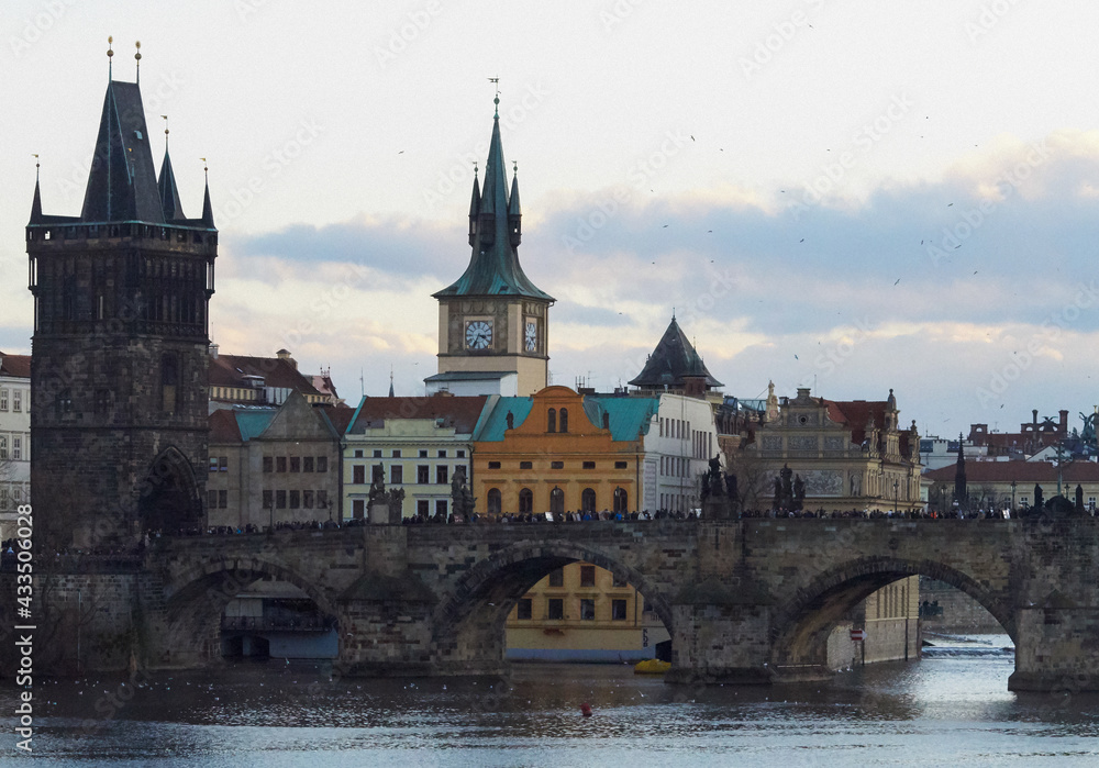 View of the medieval Charles Bridge over the Vltava River, connecting the historical districts of Mala Strana and the Old Place. Prague, Czech Republic