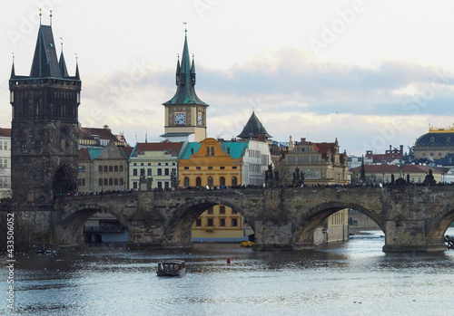 View of the medieval Charles Bridge over the Vltava River, connecting the historical districts of Mala Strana and the Old Place. Prague, Czech Republic