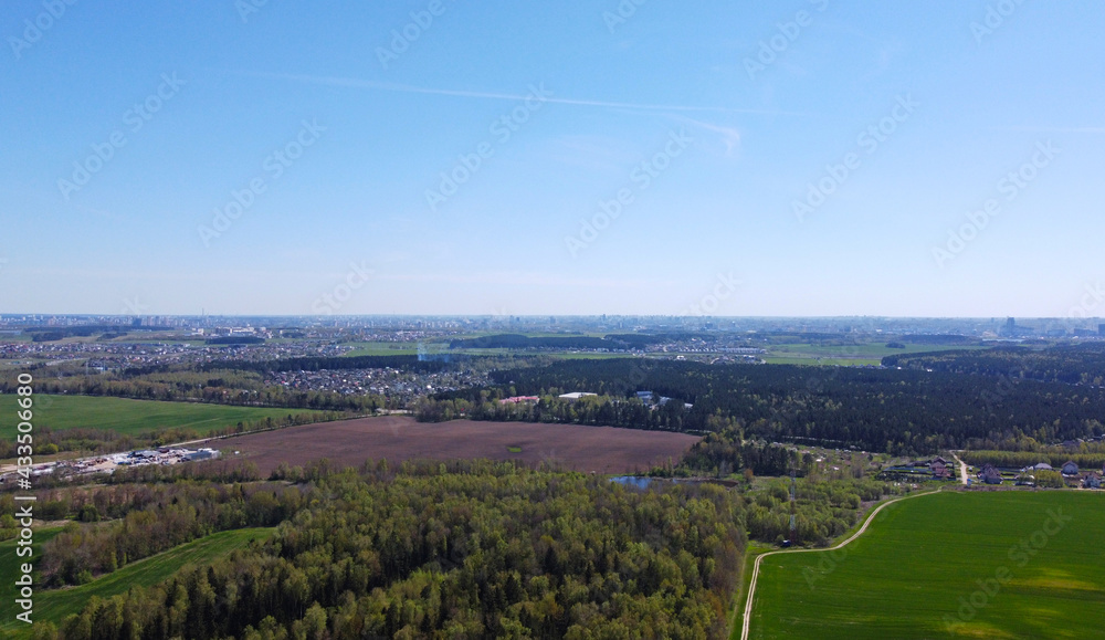 Aerial view of the summer landscape with green fields and meadows Aerial view of the summer landscape with green fields and meadows