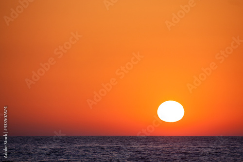 Spectacular sunset over the sea. © satur73