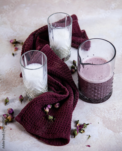 vegan hibiscus and rose latte in a glass
